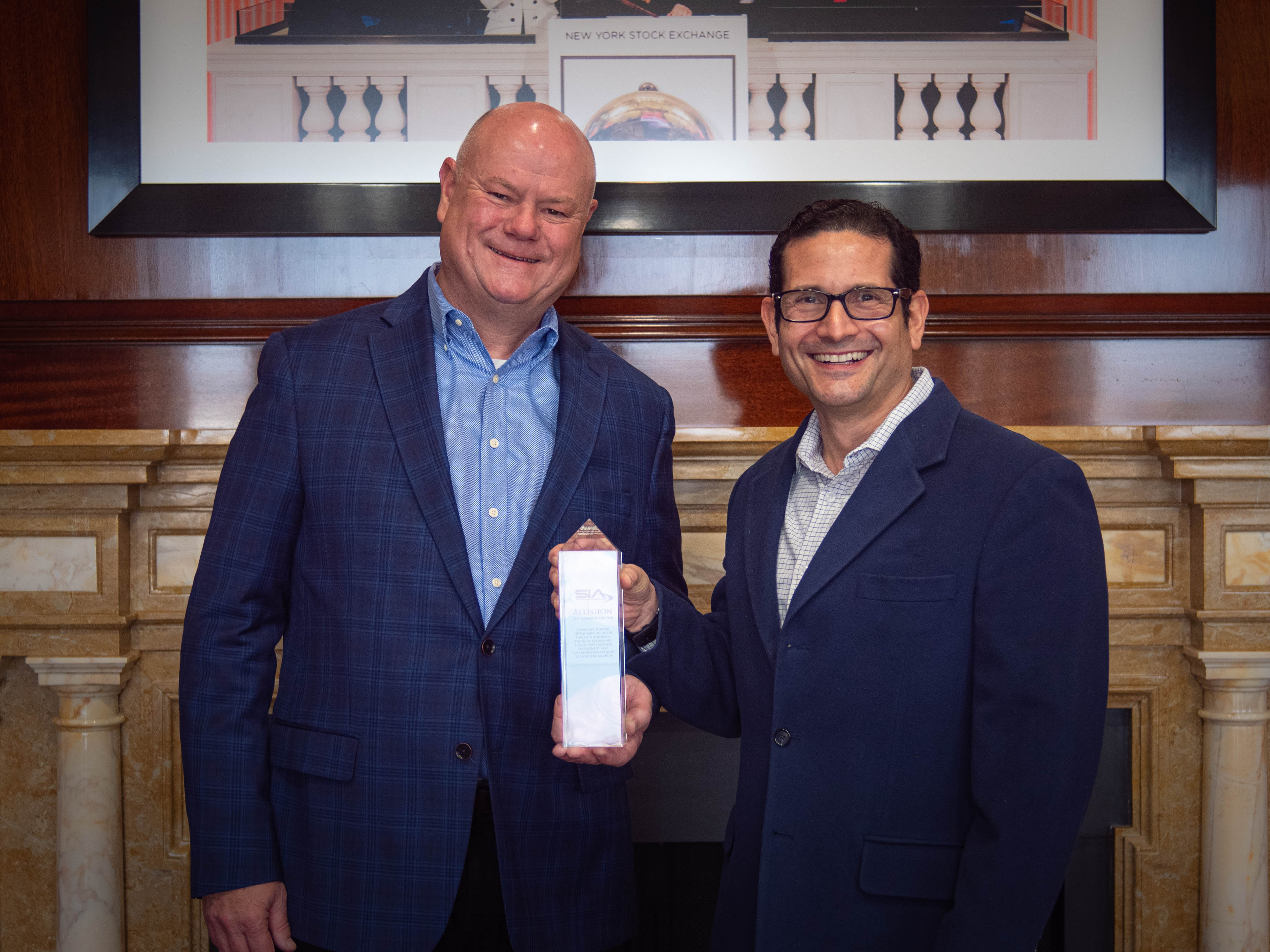 Tim Eckersley and Luis Orbegoso accept the 2021 SIA Member of the Year Award